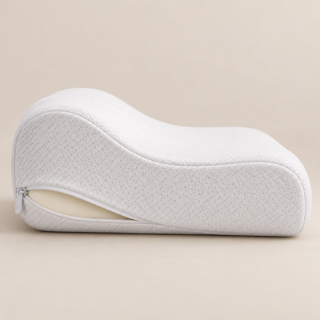 Side view of the contoured pillow with the cover zip open